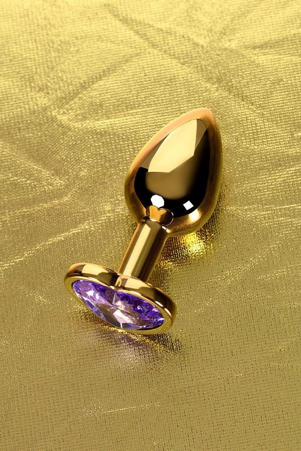 Plug analny Metal by TOYFA złoty z fioletowym kryształem 7 cm