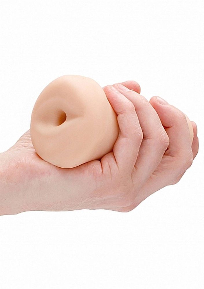 Masturbator analny samolubrykujący SLT cielisty TPE